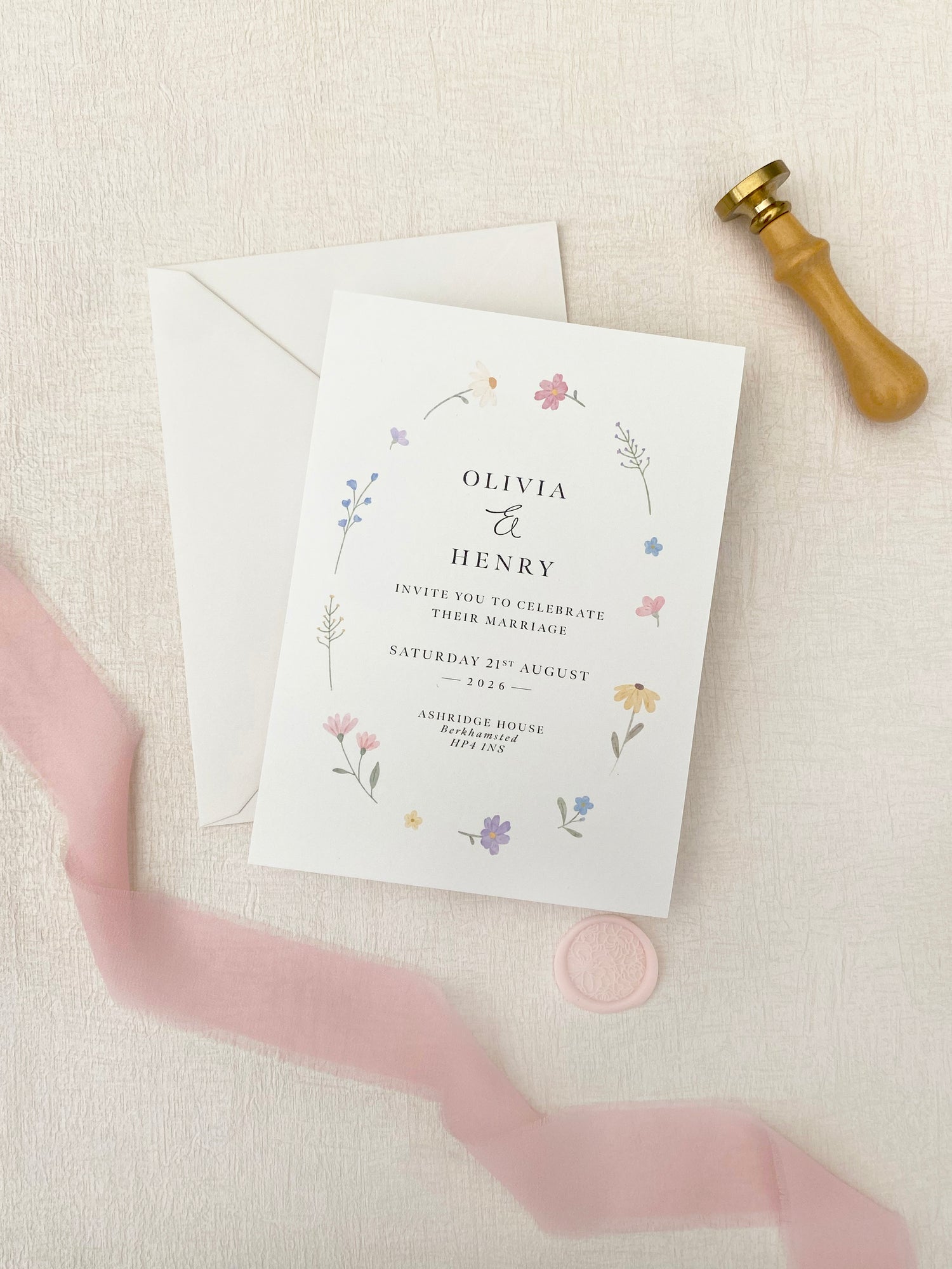Wildflower wedding invitations set with matching RSVP and detail cards in soft colours