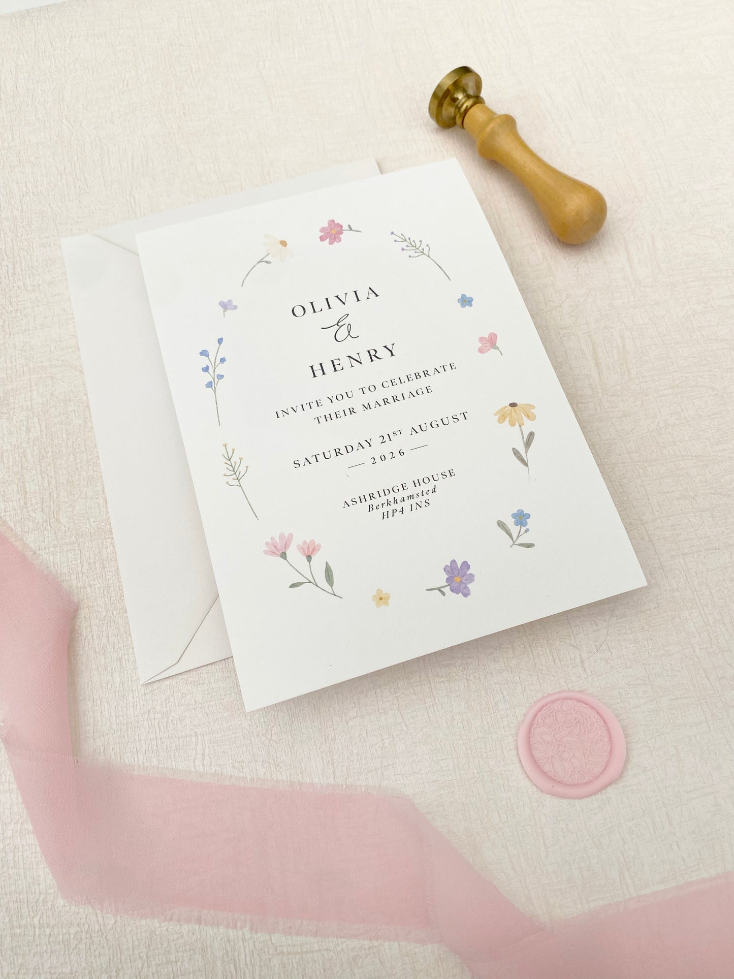 Spring wildflower wedding invitations with romantic floral design and modern layout
