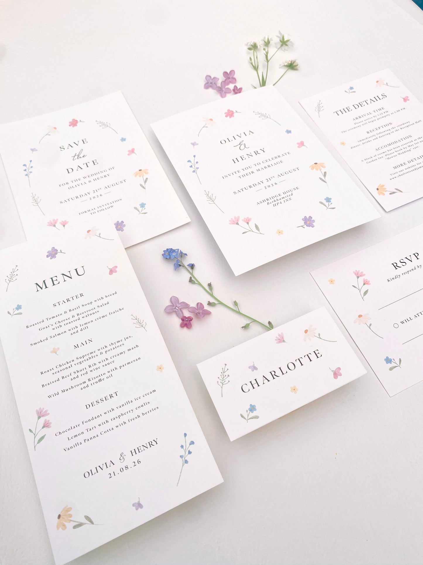 Wildflower wedding stationery suite with spring flower invitations, menus and place cards in a soft romantic design