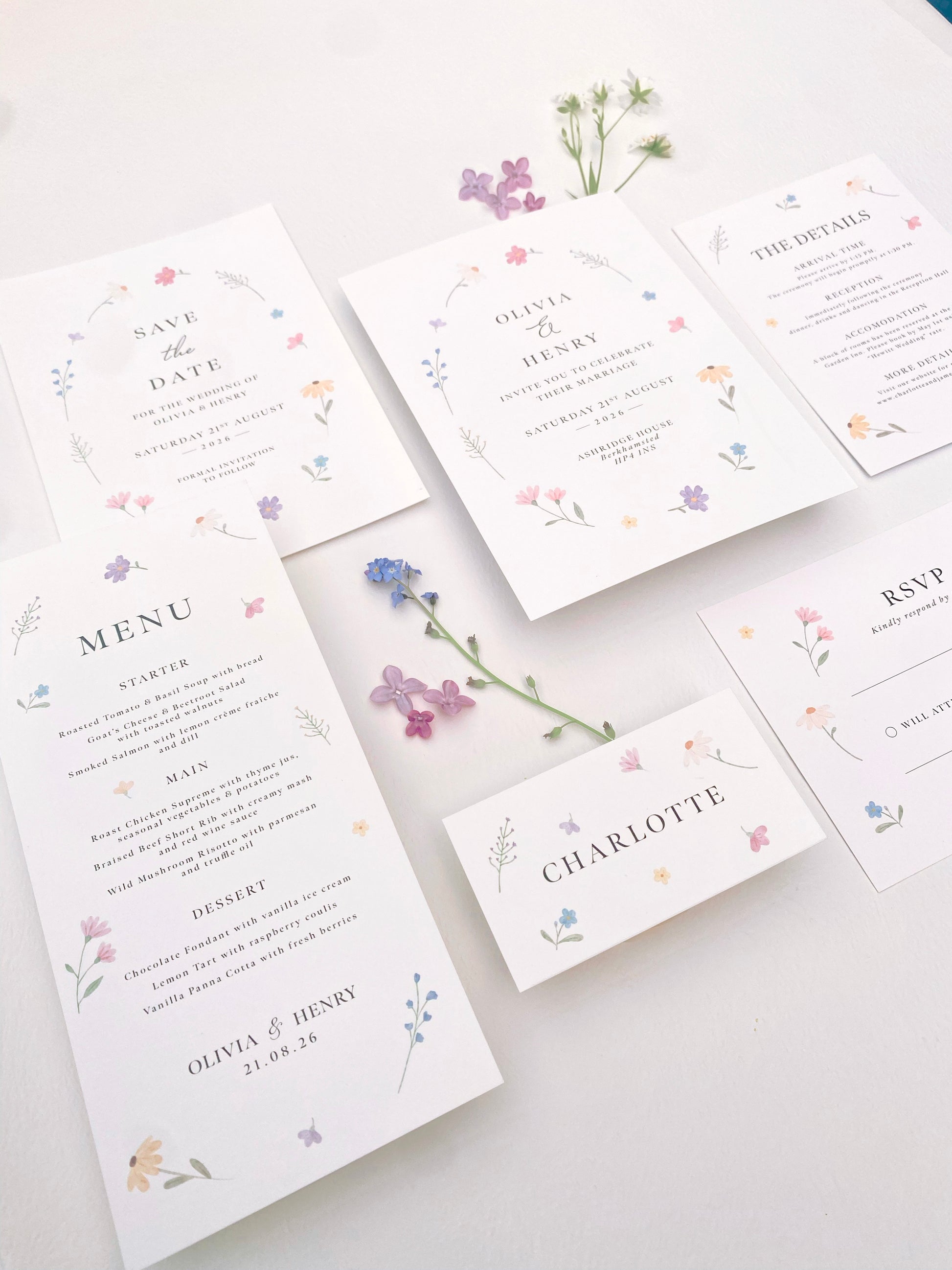 Wildflower wedding stationery suite with spring flower invitations, menus and place cards in a soft romantic design